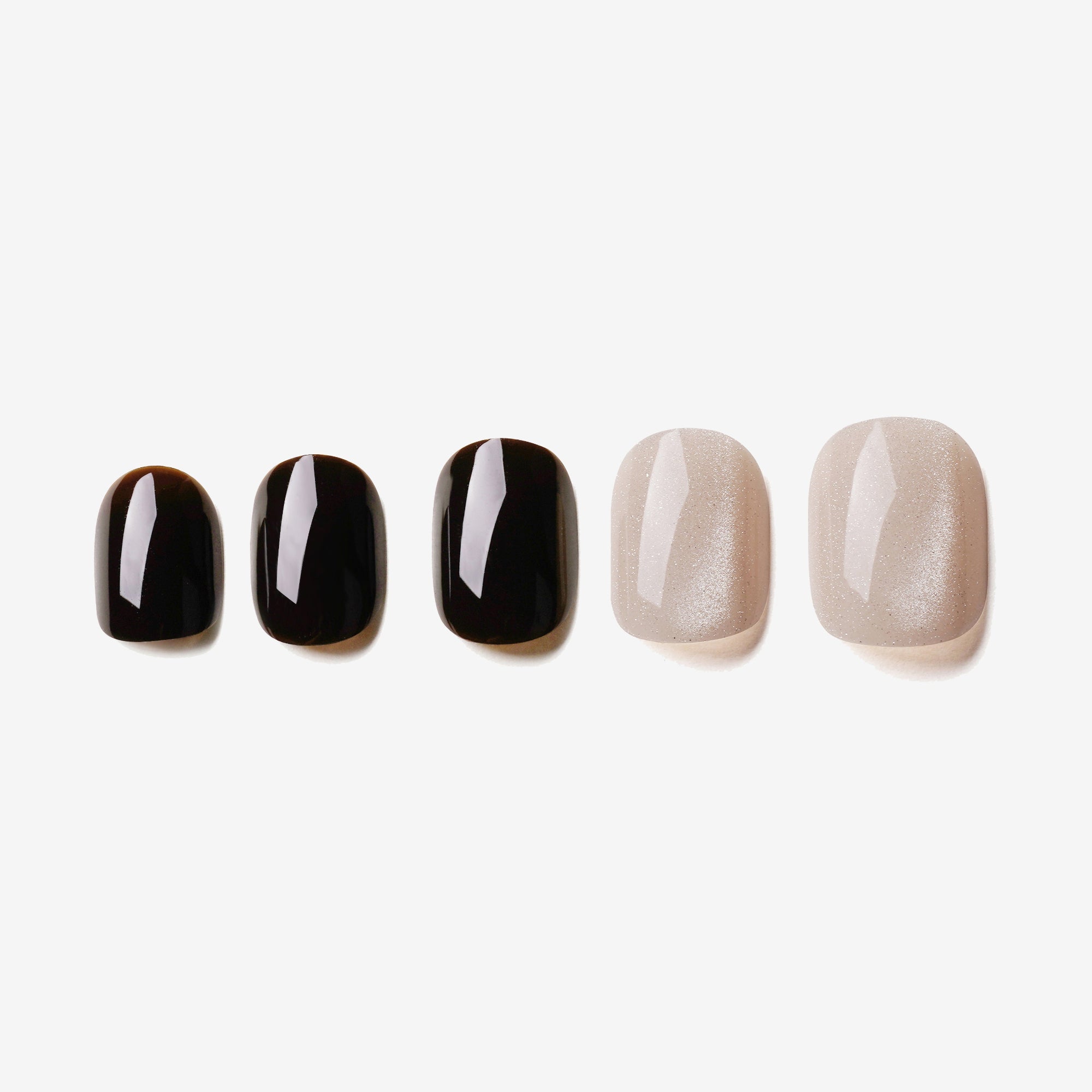 soimea faux ongles à pression bicolore en deux couleurs contrastées noir brun intense et ecru blanc effet œil-de-chat forme court rond, style classique. Faux ongles courts forme ovale color block marron foncé et blanc – effet Cat Eye. Par SOIMEA Paris