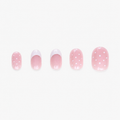 Faux ongles press-on courts Dottie Soimea avec French blanche, base nude rosée et pois en packshot