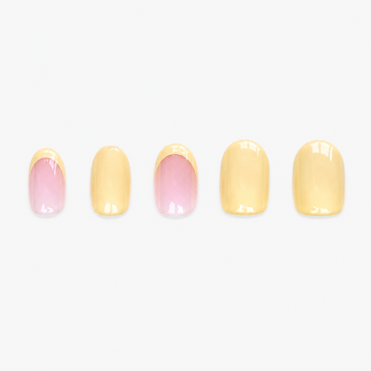 Faux ongles press-on courts Mimosa Soimea butter yellow avec French colorée et capsules unies en packshot